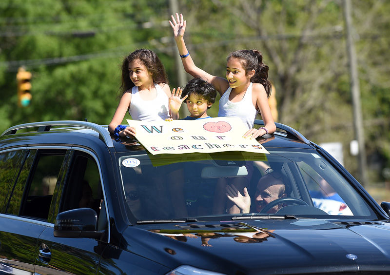 Teachers hold parade for students at Houston Academy